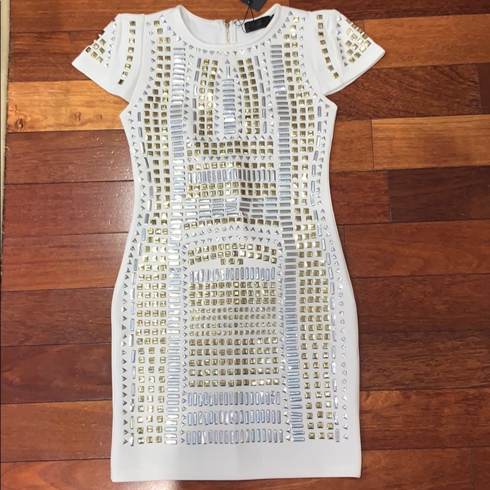 tight white with gold and silver studs dress
